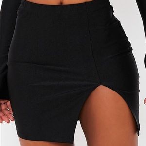 Black mini skirt with side slit